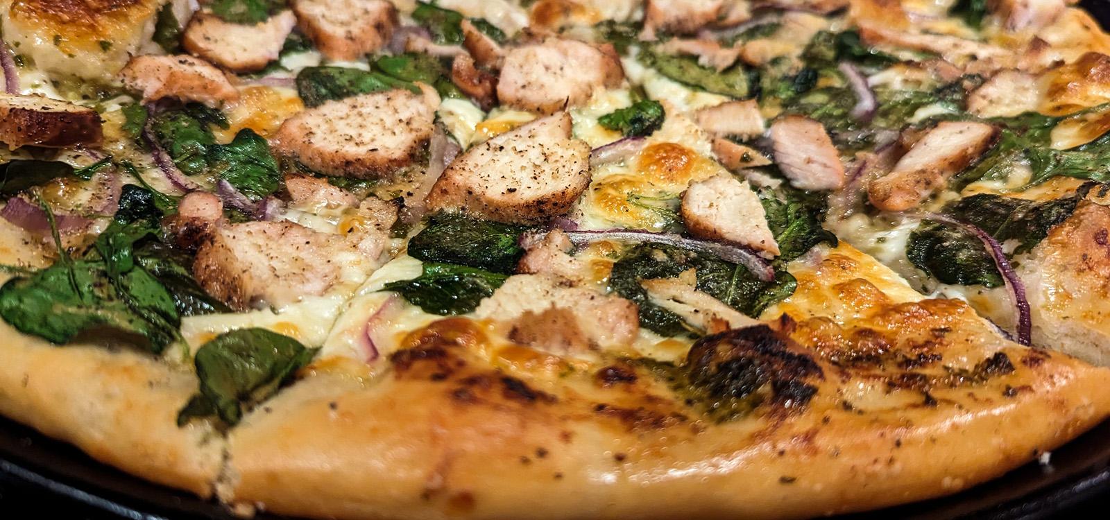 Roasted Chicken And Basil PizzaWith Olive Oil And Spinach