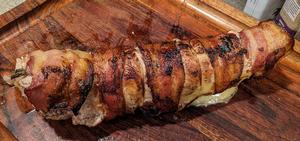 Bacon Wrapped Pork TenderloinStuffed With Sweet & Sour Braised Collard Greens and Brie and Mustard & Molasses Drizzle