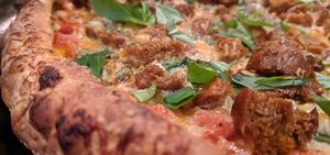 Beyond brand italian sausage, spinach, and mushroom pizza